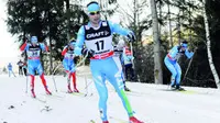 Italy's Giorgio Di Centa competes during the men's 15-kilometer Mass Start race at the cross country Tour de Ski competition, in Val di Fiemme, Italy, Saturday, Jan. 5, 2013. Di Centa finished in fourth place. (AP Photo/Elvis Piazzi)