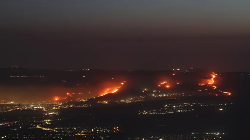 epa11387981 Fire breaks out in Kiryat Shmona, Israel, near the Lebanese border following a missile attack fired from southern Lebanon, 03 June 2024. More than 36,000 Palestinians and over 1,400 Israelis have been killed, according to the Palestinian Health Ministry and the Israel Defense Forces (IDF), since Hamas militants launched an attack against Israel from the Gaza Strip on 07 October 2023, and the Israeli operations in Gaza and the West Bank which followed it. EPA/ATEF SAFADI