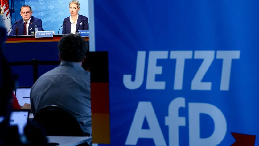 epa11620263 Alternative for Germany (AfD) right-wing political party co-chairman, Tino Chrupalla (L), and AfD deputy chairwoman, Alice Weidel (R), attend an attend an AfD party press conference in Berlin, 23 September 2024. The far-right Alternative for Germany (AfD) has taken second place in the state elections in Brandenburg, behind the Social Democratic Party (SPD), with 29 percent of the vote. EPA/Filip Singer