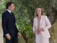 French President Emmanuel Macron (L) during the welcome ceremony with Italy's Prime Minister Giorgia Meloni (R), during the G7 Borgo Egnazia Summit in Borgo Egnazia (Brindisi), southern Italy, 13 June 2024. The G7 Borgo Egnazia Summit will be held from 13 to 15 June 2024. ANSA/ETTORE FERRARI