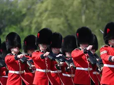 epa09906852 The Grenadier Guards perform the Changing of the Guard outside Buckingham Palace in London, Britain, 24 April 2022. The Changing of the Guard is a traditional military ceremony carried out daily where a group of soldiers who protect Buckingham Palace are replaced by a new group of soldiers. The Grenadier guards have protected British Kings and Queens at various royal palaces since 1656. EPA/ANDY RAIN
