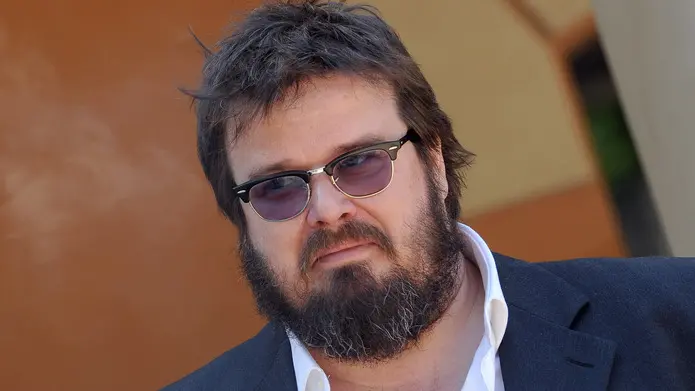 L'attore Giuseppe Battiston, in posa mentre fuma il sigaro durante il photo call prima della conferenza stampa del film: 'Notizie degli scavi', regia di Emidio Greco, presentato oggi 18 aprile 2011 alla Casa del Cinema di Villa Borghese a Roma e nelle sale dal prossimo 29 aprile. ANSA/CLAUDIO ONORATI
