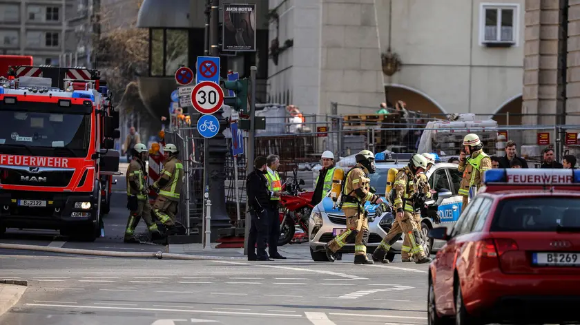 epa08350011 Fire engines and fire department vehicles are parked while Berlin firefighters walk outside the City Palace structure at the construction site of the yet-to-be-completed Humboldt Forum (a future exhibition area housing several museum collections) in Berlin, Germany, 08 April 2020. According to the German capital's firefighting service, two tar boilers burned on the ground floor of the construction site. One person was slightly injured, but the blaze was contained shortly after erupting, the fire brigade added. EPA/OMER MESSINGER