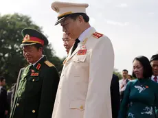 epa05432886 Vietnam's General Do Ba Ty, National Assembly Vice Chairman (L) and To Lam, Minister of Public Security (C) leave after attending a wreath laying ceremony at Martyrs Memorial ahead of the opening of the first session of the 14th National Assembly in Hanoi, Vietnam, 20 July 2016. The assembly runs from 20 to 29 July. EPA/LUONG THAI LINH