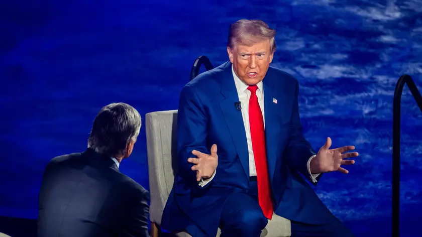 epa11585581 Former US President and current Republican presidential nominee Donald Trump (R) and conservative broadcaster Sean Hannity (L) speak during a FOX News town hall in Harrisburg, Pennsylvania, USA, 04 September 2024. Both Trump and his democratic opponent, Vice President Harris, are devoting and extensive amount of time and money in the battleground state of Pennsylvania. EPA/JIM LO SCALZO