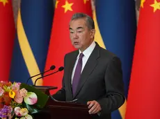 epa11100152 Chinese Foreign Minister Wang Yi gives a speech after signing the Joint Communiqué on the Resumption of Diplomatic Relations between the People's Republic of China and the Republic of Nauru, at Diaoyutai State Guesthouse in Beijing, China, 24 January 2024. EPA/Andrea Verdelli / POOL