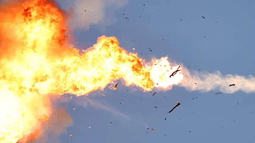 epa11563783 A Hezbollah unmanned aerial vehicle (UAV) crossing from Lebanon gets intercepted by an Israeli fighter jet over an area near the Lebanon-Israel border, as seen from northern Israel, 25 August 2024. The Israeli military stated that Israeli Air Force fighter jets are currently striking targets belonging to the Hezbollah organization that posed an imminent threat to the citizens of the State of Israel. EPA/ATEF SAFADI