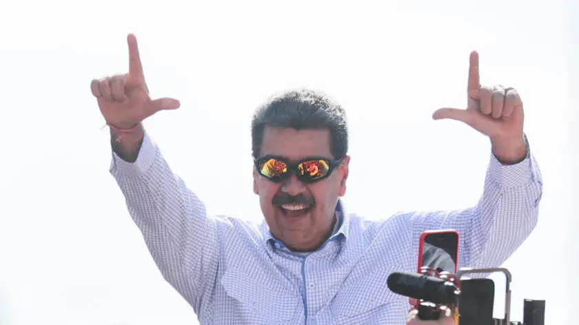 epa11384972 A handout photo made available by Miraflores Press shows Venezuelan President Nicolas Maduro during a visit to Maracaibo, Zulia state, Venezuela, 01 June 2024. Venezuela registered in May its lowest inflation in 20 years, according to Maduro's statement during a meeting with political structures of the United Socialist Party (PSUV) in Zulia. EPA/Miraflores Press ONLY AVAILABLE TO ILLUSTRATE THE ACCOMPANYING STORY/CREDIT MANDATORY HANDOUT EDITORIAL USE ONLY/NO SALES HANDOUT EDITORIAL USE ONLY/NO SALES