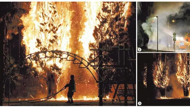 Nella foto grande un pompiere cerca di spegnere le fiamme che stanno divorando un albero secolare nel parco della Rimembranza davanti alla Marcelliana e al supermercato; 2- I mezzi dei vigili del fuoco sulla strada riescono a domare il fuoco del primo albero incendiato; 3-Le impressionanti immagini del rogo che si estende all’interno dell’area verde frequentata dalle famiglie (foto Katia Bonaventura)
