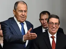 epa11405367 Russian Foreign Minister Sergei Lavrov (L) and his Cuban counterpart Bruno Rodriguez Parrilla (R) enter a hall during their meeting in Moscow, Russia, 12 June 2024. EPA/NATALIA KOLESNIKOVA / POOL