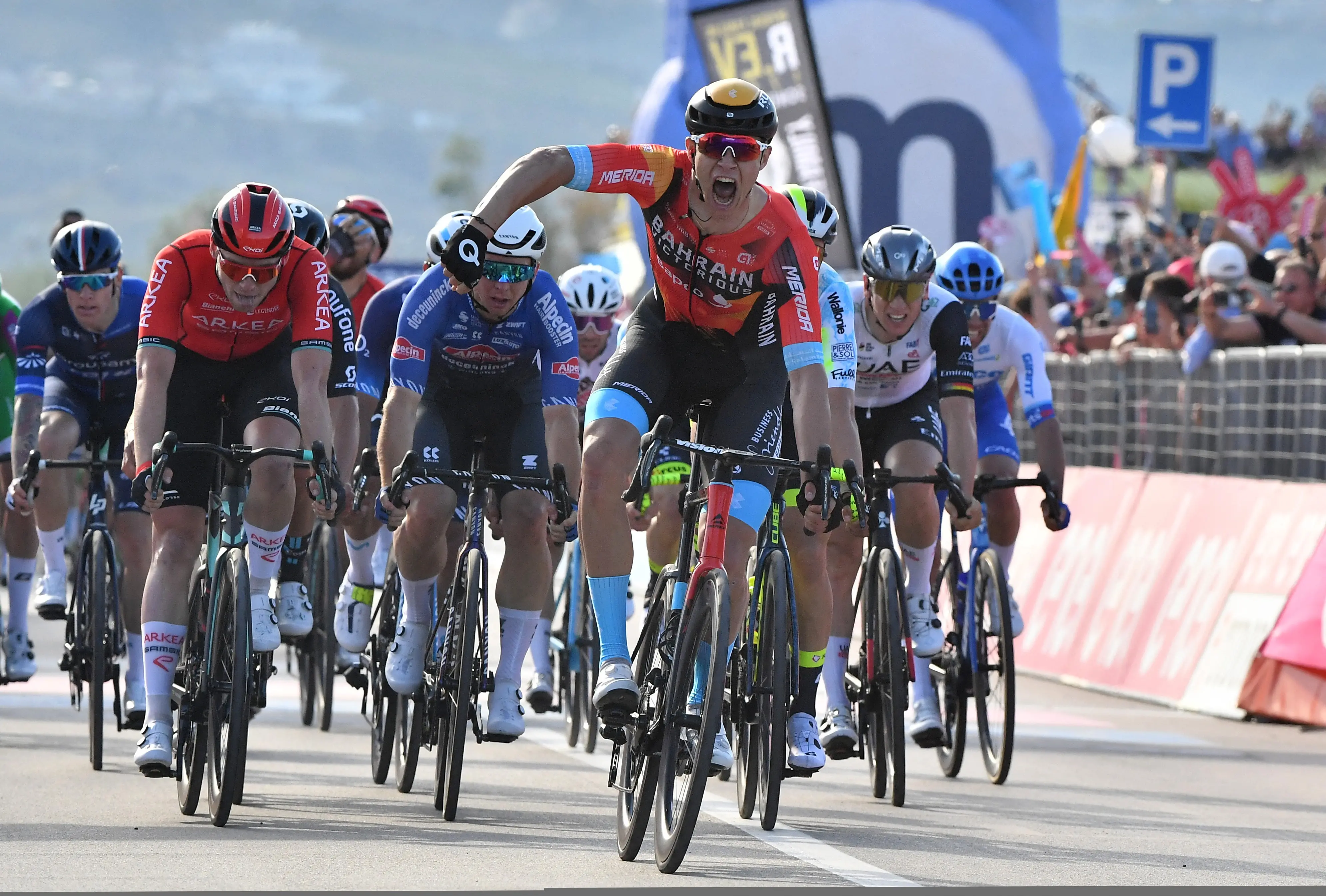 Cycling - Giro d'Italia - Stage 2 - Teramo to San Salvo - Italy - May 7, 2023 Bahrain – Victorious' Jonathan Milan celebrates winning stage 2 REUTERS/Jennifer Lorenzini