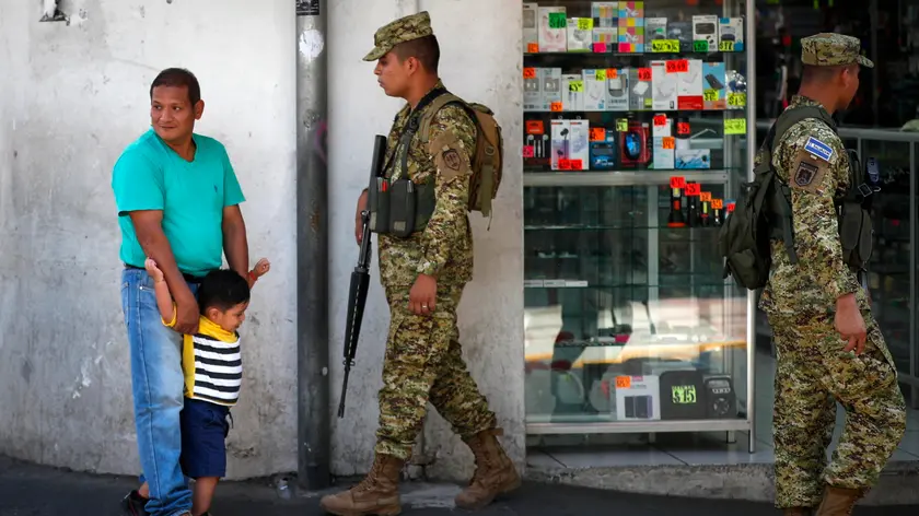 epa11121954 Military personnel patrol the streets in San Salvador, El Salvador, 02 February 2024. The streets of El Salvador woke up with a military presence on its streets as a security measure in the face of the upcoming presidential elections, in which President Nayib Bukele will seek re-election with the emergency regime as the main action of his current Government. EPA/Bienvenido Velasco