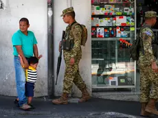 epa11121954 Military personnel patrol the streets in San Salvador, El Salvador, 02 February 2024. The streets of El Salvador woke up with a military presence on its streets as a security measure in the face of the upcoming presidential elections, in which President Nayib Bukele will seek re-election with the emergency regime as the main action of his current Government. EPA/Bienvenido Velasco