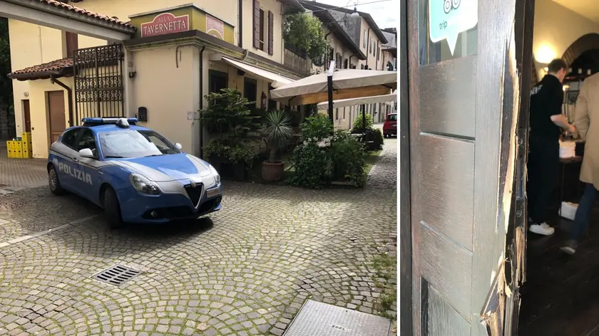 La polizia in via di Prampero e, a destra, la porta sfondata dai ladri