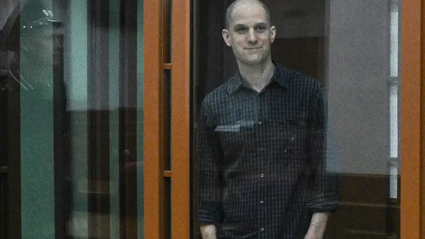 epa11439458 WSJ correspondent Evan Gershkovich stands in a glass cage prior to a hearing in Yekaterinburg's Sverdlovsk Regional Court, Yekaterinburg, Russia, 26 June 2024. Evan Gershkovich, a US journalist of The Wall Street Journal covering Russia, was detained in Yekaterinburg on 29 March 2023. The Russia's Federal Security Service (FSB) claimed that on the instructions of the American authorities, the journalist collected information constituting a state secret about one of the enterprises of the Russian military-industrial complex. He is charged with espionage under Art. 276 of the Criminal Code of the Russian Federation, which could carry a sentence of up to 20 years. EPA/STRINGER