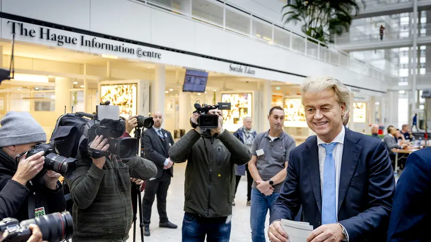 epa10988938 Party for Freedom (PVV) leader Geert Wilders (R) casts his vote in the House of Representatives elections at a polling station in The Hague, The Netherlands, 22 November 2023. Dutch voters are heading to the polls on 22 November to elect the members of the House of Representatives and a new prime minister, after Netherlands' longest-serving prime minister, Mark Rutte's cabinet collapsed in July. EPA/REMKO DE WAAL