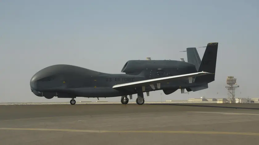 epa07660711 A handout photo made available by the US Air Force shows a RQ-4 Global Hawk unmanned airccraft at Al Dhafra Air Base, United Arab Emirates, 13 February 2019 (issued 20 June 2019). Media reports on 20 June 2019 state that Iran's Islamic Revolution Guards Corps (IRGC) claim to have shot down a US spy drone over Iranian airspace, near Kuhmobarak in Iran's southern Hormozgan province. The US military has confirmed one of their drones was hit by an Iranian missile. EPA/Darrion Brownin / US AIR FORCE HANDOUT HANDOUT EDITORIAL USE ONLY/NO SALES
