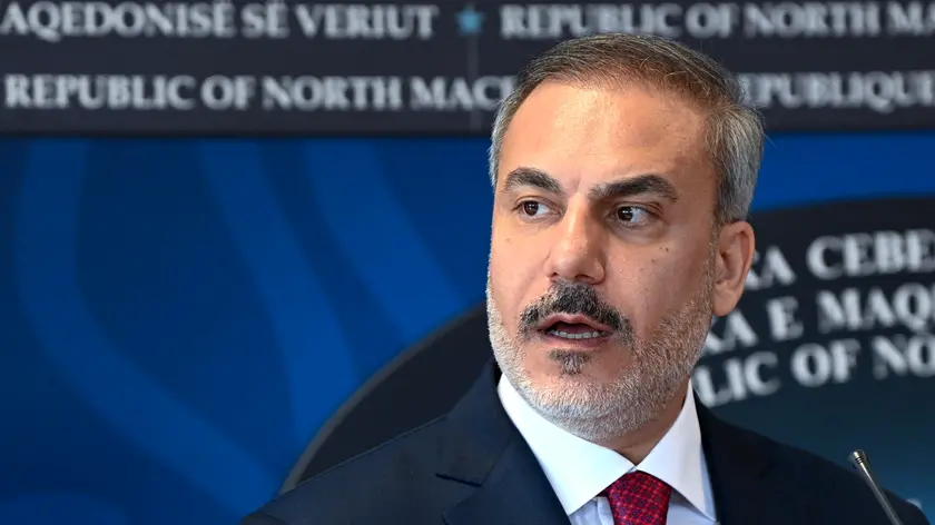 epa11586478 Turkish Foreign Minister Hakan Fidan, accompanied by his North Macedonian counterpart, attends their joint press conference in Skopje, Republic of North Macedonia, 05 September 2024. The Turkish foreign minister arrived on a two-day official visit to North Macedonia. EPA/GEORGI LICOVSKI