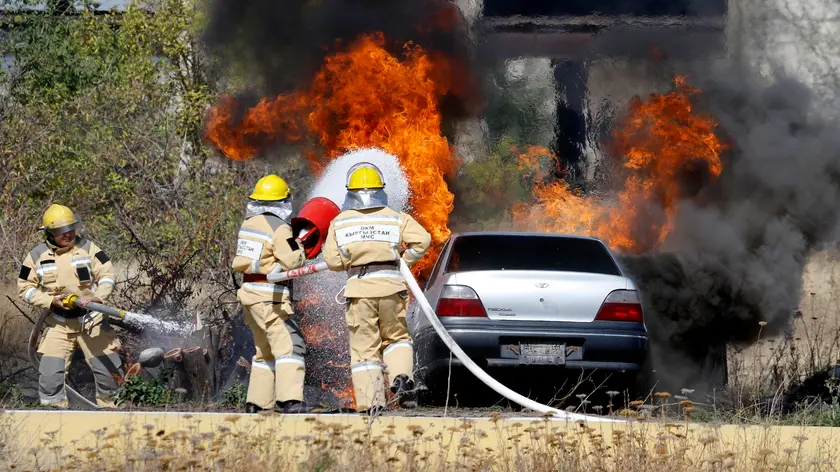 epa10873983 Rescuers from Kyrgyzstan's Ministry of Emergency Situations extinguish a fire as they take part in anti-terrorism exercises at Thermal Power Plant -2 near Bishkek, Kyrgyzstan, 21 September 2023. The 'Eurasia-Antiterror - 2023', the first joint anti-terrorist exercises of the Commonwealth of Independent States (CIS) and the Shanghai Cooperation Organization (SCO) took place in the Kyrgyz Republic. Eleven CIS and SCO member states (Armenia, Belarus, India, Iran, Kazakhstan, China, Kyrgyzstan, Pakistan, Russia, Tajikistan and Uzbekistan) took part in the joint anti-terrorist exercises. EPA/IGOR KOVALENKO