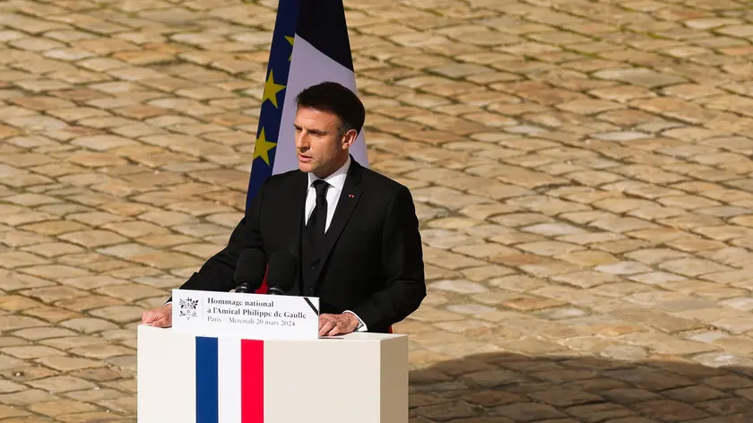 epa11231123 French President Emmanuel Macron walks gives an speech during the ceremony to pay tribute to Philippe De Gaulle, son of general Charles De Gaulle, in the courtyard of the Hotel des Invalides in Paris, France, 20 March 2024. Philippe De Gaulle, son of general Charles De Gaulle, has died at age 102 on 13 March 2024. EPA/TERESA SUAREZ