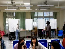 epa11072801 Citizens cast their votes for the 2024 presidential election at a polling station in New Taipei City, Taiwan, 13 January 2024. Presidential candidates from the Democratic Progressive Party (DPP), Kuomintang (KMT), and Taiwan’s People’s Party (TPP) have been campaigning to get support from Taiwanese voters. EPA/DANIEL CENG