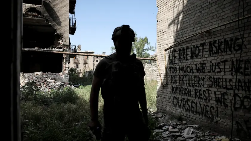 epa11581315 A handout picture made available by the press service of the 24th Mechanized Brigade of the Ukrainian Armed Forces on 03 September 2024 shows a serviceman walking in the destroyed city of Chasiv Yar, in the Donetsk region, Ukraine, 02 September 2024. Andrii Polukhin, a spokesperson for the 24th Mechanized Brigade named after King Danylo, said on 29 August 2024 that the town had been destroyed in the fighting with Russian forces. About 12,000 people lived in Chasiv Yar before the full-scale invasion, but only about 700 people remained there by April 2024. The Governor of Donetsk Oblast, Vadym Filashkin, reiterated in his message that civilians should evacuate the town. Russian troops entered Ukrainian territory on 24 February 2022, starting a conflict that has provoked destruction and a humanitarian crisis. EPA/PRESS SERVICE OF 24 MECHANIZED BRIGADE / HANDOUT HANDOUT EDITORIAL USE ONLY/NO SALES