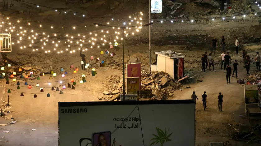 epa11585182 Palestinians gather in a street during clashes with Israeli troops amid an ongoing Israeli military operation, in the West Bank city of Jenin, 04 September 2024. According to the Palestinian Health Ministry, at least 33 Palestinians have been killed and around 130 have been injured as of 03 September since an Israeli military operation began on 28 August 2024 in the West Bank cities of Tulkarem, Jenin and Tubas. According to the IDF, Israel is conducting a large-scale 'counterterrorism operation' in several areas. EPA/ALAA BADARNEH *** Local Caption ***