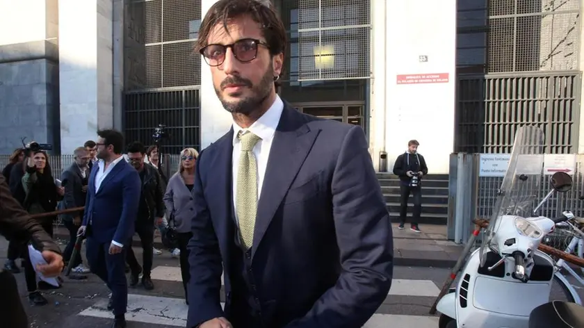 Italian photographic agent, television and media personality Fabrizio Corona leavs Milan's Palace of Justice, 22 October 2015. He was audienced by a judge called to decide if confirm or not Social Services for him. ANSA / MATTEO BAZZI