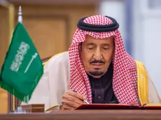 epa10355142 A handout photo made available by the Saudi Royal Court shows Saudi King Salman bin Abdulaziz Al Saud signing documents with Chinese President Xi (not pictured) during his visit in Riyadh, Saudi Arabia, 08 December 2022. Chinese President Xi Jinping is on a three day working visit to Saudi Arabia, in the framework of strengthening the ties between the two countires, as well as a summit with the members of the Gulf Cooperation Council and a wider China-Arab summit. EPA/BANDAR ALJALOUD / HANDOUT HANDOUT EDITORIAL USE ONLY/NO SALES