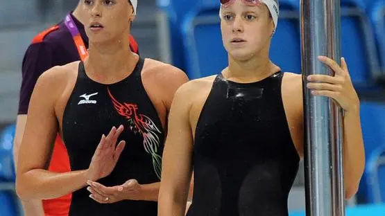 Federica Pellegrini (L) and Alice Mizzau of Italy during the Heat 2 of the Women's 4 X 100m Freestyle Relay event during the Swimming competition held at the Aquatics Center during the London 2012 Olympic Games in London, England, 28 July 2012. ANSA/ETTORE FERRARI