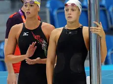 Federica Pellegrini (L) and Alice Mizzau of Italy during the Heat 2 of the Women's 4 X 100m Freestyle Relay event during the Swimming competition held at the Aquatics Center during the London 2012 Olympic Games in London, England, 28 July 2012. ANSA/ETTORE FERRARI