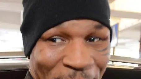 (FILE) Former US heavyweight boxing world champion Mike Tyson arrives to Warsaw, Poland, 26 April 2012, for an advertising campaign of an energy drink. EPA/BARTLOMIEJ ZBOROWSKI POLAND OUT