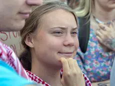 epa11436445 Swedish climate activist Greta Thunberg attends a demonstration of environmental movement Ekokapina, Extinction Rebellion Finland, in front of the Finnish parliament building in Helsinki, Finland, 25 June 2024. EPA/MAURI RATILAINEN