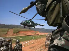 epaselect epa04873752 A helicopter of the Peruvian Armed Forces lands at Valle Esmeralda military base in Junin province, Peru, Peru, 05 August 2015. The Peruvian Armed Forces continues operations to fight against the remnants of the Shining Path rebel group. EPA/Ernesto Arias