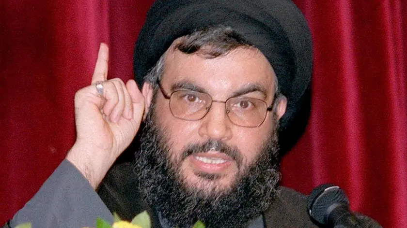 BEI01 - 20010710 - BEIRUT, LEBANON : Hezbollah chief Sheikh Hasan Nasrallah gestures during a speech at the opening of Hezbollah summer activities Tusday10 July 2001 in Haret Hreik, a suburb of Beirut. Israeli Defence Minister Binyamin Ben Eliezer accused the United Nations of bowing to the Lebanese guerrilla movement in an increasingly bitter feud over a UN videotape filmed after the abduction of three Israeli soldiers by Hezbollah in October. EPA PHOTO AFP/ANWAR AMRO