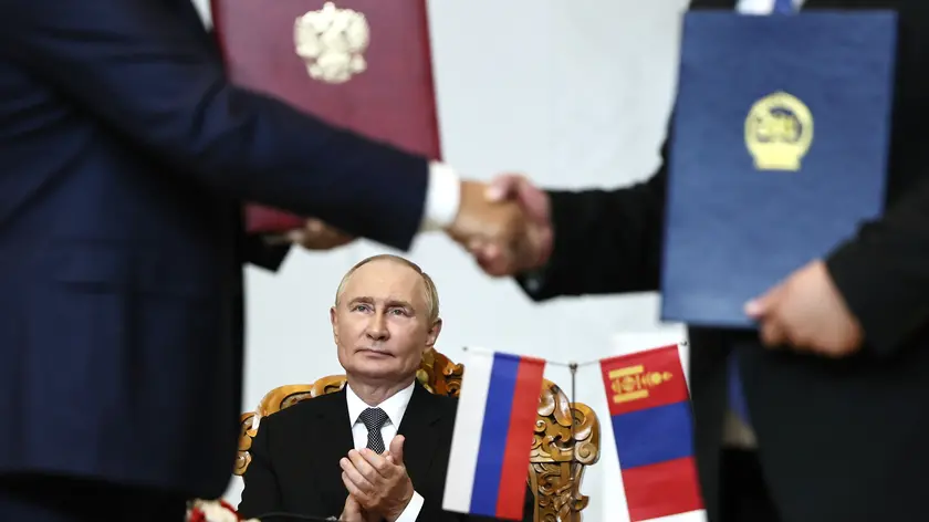 epa11582233 Russian President Vladimir Putin gestures as he attends a signing ceremony, in Ulaanbaatar, Mongolia, 03 September 2024. Putin visits Mongolia in his first trip to a member state of the International Criminal Court (ICC) since the court issued an arrest warrant for him last year. EPA/SOFIA SANDURSKAYA /SPUTNIK/KREMLIN POOL MANDATORY CREDIT
