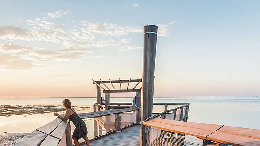 Lignano Sabbiadoro, Province of Udine, Friuli-Venezia Giulia, Italy. Sunset over lagoon of Lignano Sabbiadoro