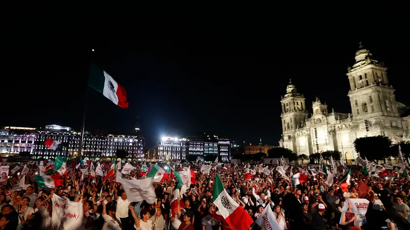 epa11386654 Supporters of Mexico's Presidential candidate Claudia Sheinbaum celebrate after knowing the preliminary results of the general elections in Mexico City, Mexico, 03 June 2024. Sheinbaum, a climate scientist and former mayor of Mexico City, is to be Mexico's first female President after she obtained between 58.3 and 60.7 per cent of the votes during the electoral night, according to the preliminary results announced by the National Electoral Institute. EPA/JOSE MENDEZ