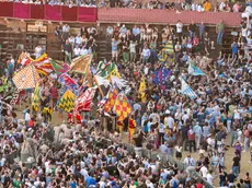 Jockey Carlo Sanna, also known as Brigante, on horse Tabacco winning the historical horse race 'Palio di Siena' has been postponed to 3 July due to the rain the historical horse race 'Palio di Siena' in Siena, Italy, 04 July 2024. The traditional horse races between the Siena city districts will be held 02 July as the 'Palio di Provenzano' on the holiday of the Madonna of Provenzano and on 16 August as the 'Palio dell'Assunta' on the holiday of the Virgin Mary. ANSA/CLAUDIO GIOVANNINI