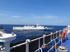 epa11144583 A handout photo made available by the Philippine Coast Guard (PCG) shows China Coast Guard (CCGV-3105) patrol ship maneuvering near Philippine Coast Guard vessel BRP Teresa Magbanua (MRRV-9701) at the vicinity of Scarborough Shoal, Philippines, in the disputed waters of the South China Sea, on 08 February 2024 (issued on 11 February 2024). According to a report from the Philippine Coast Guard (PCG), on 08 February, a China Coast Guard (CCGV-3105) patrol ship conducted a blocking and dangerous maneuver by passing through from port beam to dead ahead of the Philippine Coast Guard BRP Teresa Magbanua (MRRV-9701) vessel. The South China Sea dispute has been ongoing for several years with China, the Philippines, Vietnam, Malaysia, Brunei, and Taiwan, all fighting for sovereignty in the maritime region. EPA/PHILIPPINE COAST GUARD HANDOUT HANDOUT EDITORIAL USE ONLY/NO SALES HANDOUT EDITORIAL USE ONLY/NO SALES