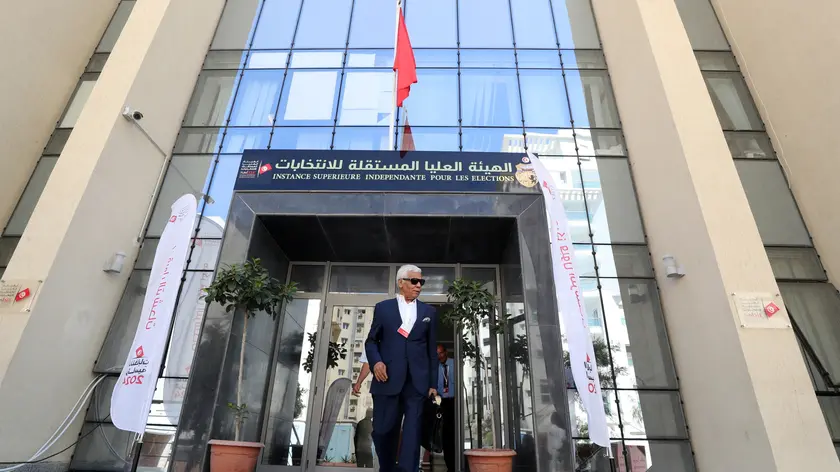 epa11530808 Former Tunisian MP, journalist and writer Ahmed Safi Said leaves after submiting his candidacy for the upcoming presidential elections, at the Independent Higher Authority for the Elections in Tunis, Tunisia, 06 August 2024. Tunisia's Presidential elections are scheduled on 06 October 2024. EPA/MOHAMED MESSARA