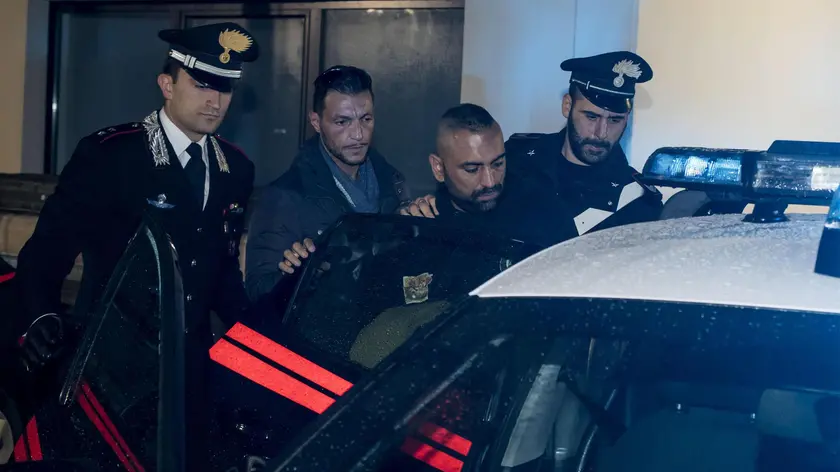 Roberto Spada (2R), brother of Ostia clan chief Carmine, leaves the barracks of the Carabinieri to be brought into jail, Ostia, Italy, 09 November 2017. Spada was in custody after attacking a RAI State broadcaster TV crew in the coastal town near Rome. Spada is under investigation for grievous bodily harm and private violence with the aggravating factor of acting in a mafia context, judicial sources said. ANSA/MASSIMO PERCOSSI